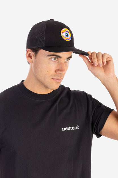 Black trucker cap with embroidered eye design and curved brim worn with black nootropics t-shirt. - Neutonic - Trucker Cap - Eye